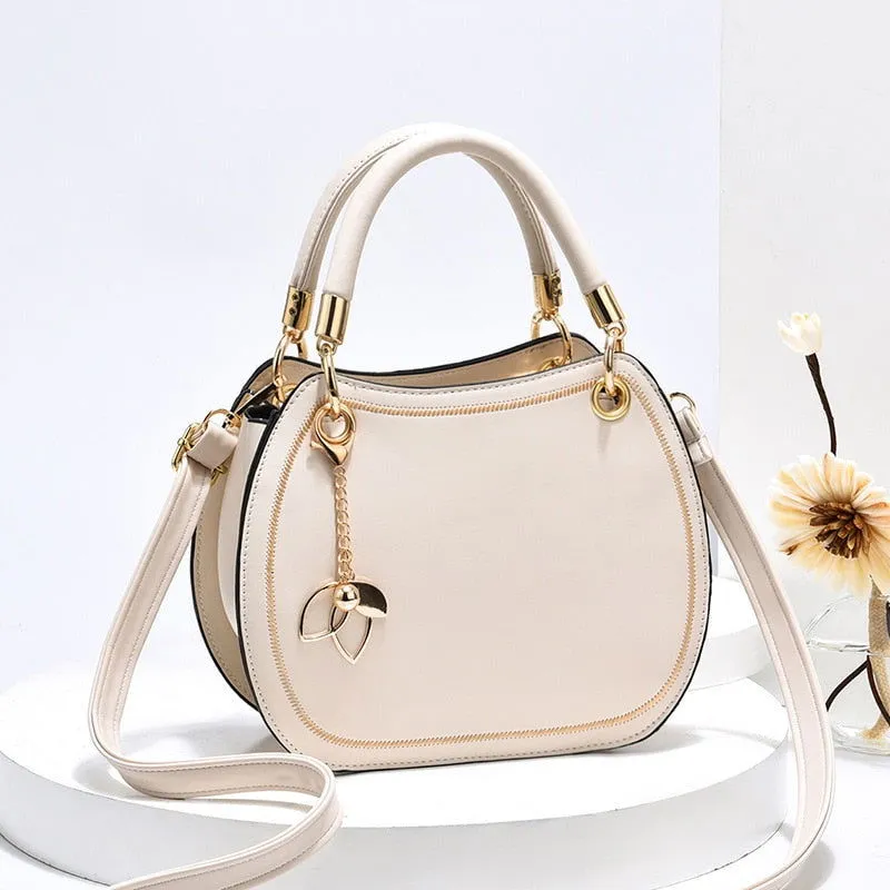 Saddle Shape Flower Pendant Leather Handbags
